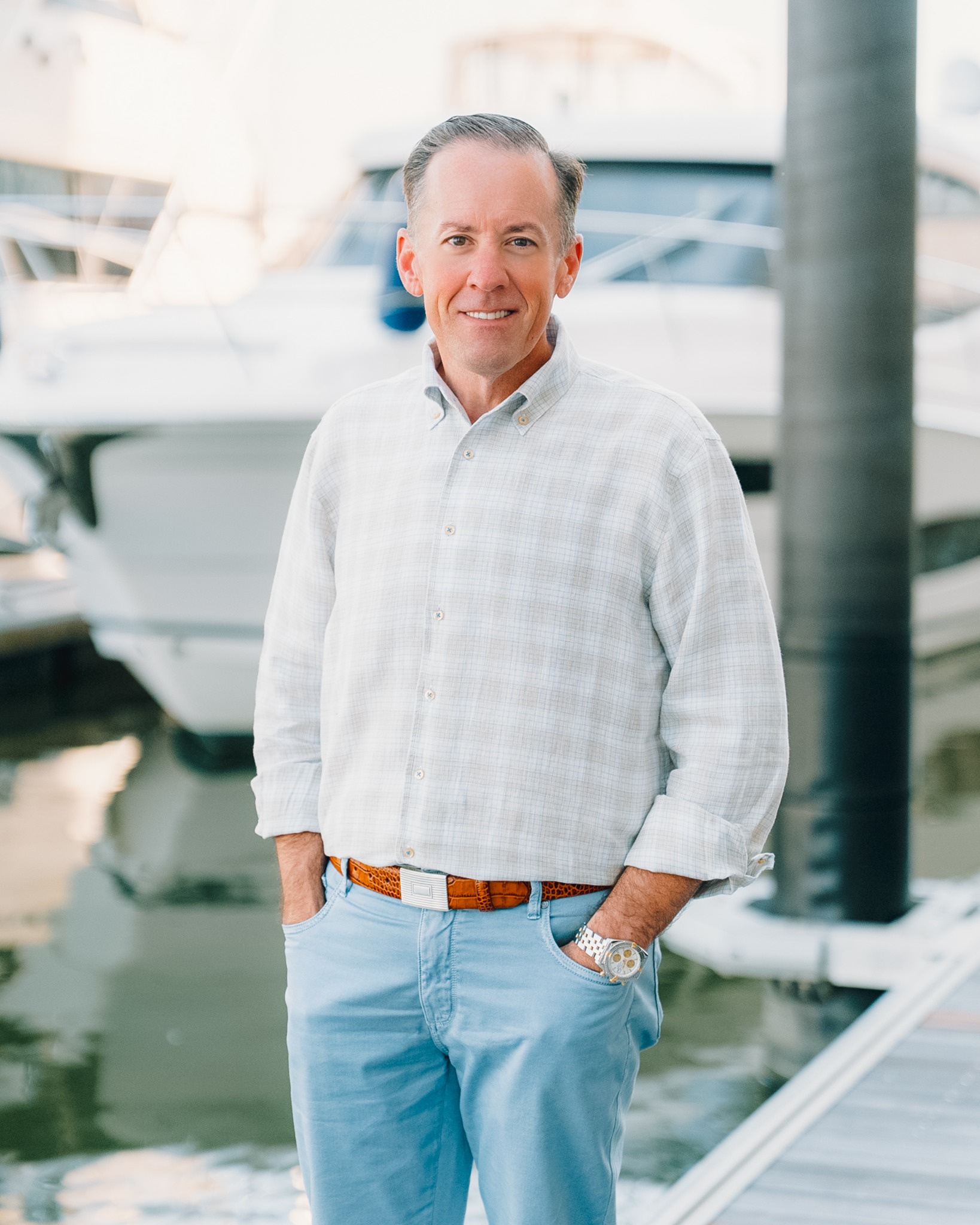 David Hagood standing beside a marina