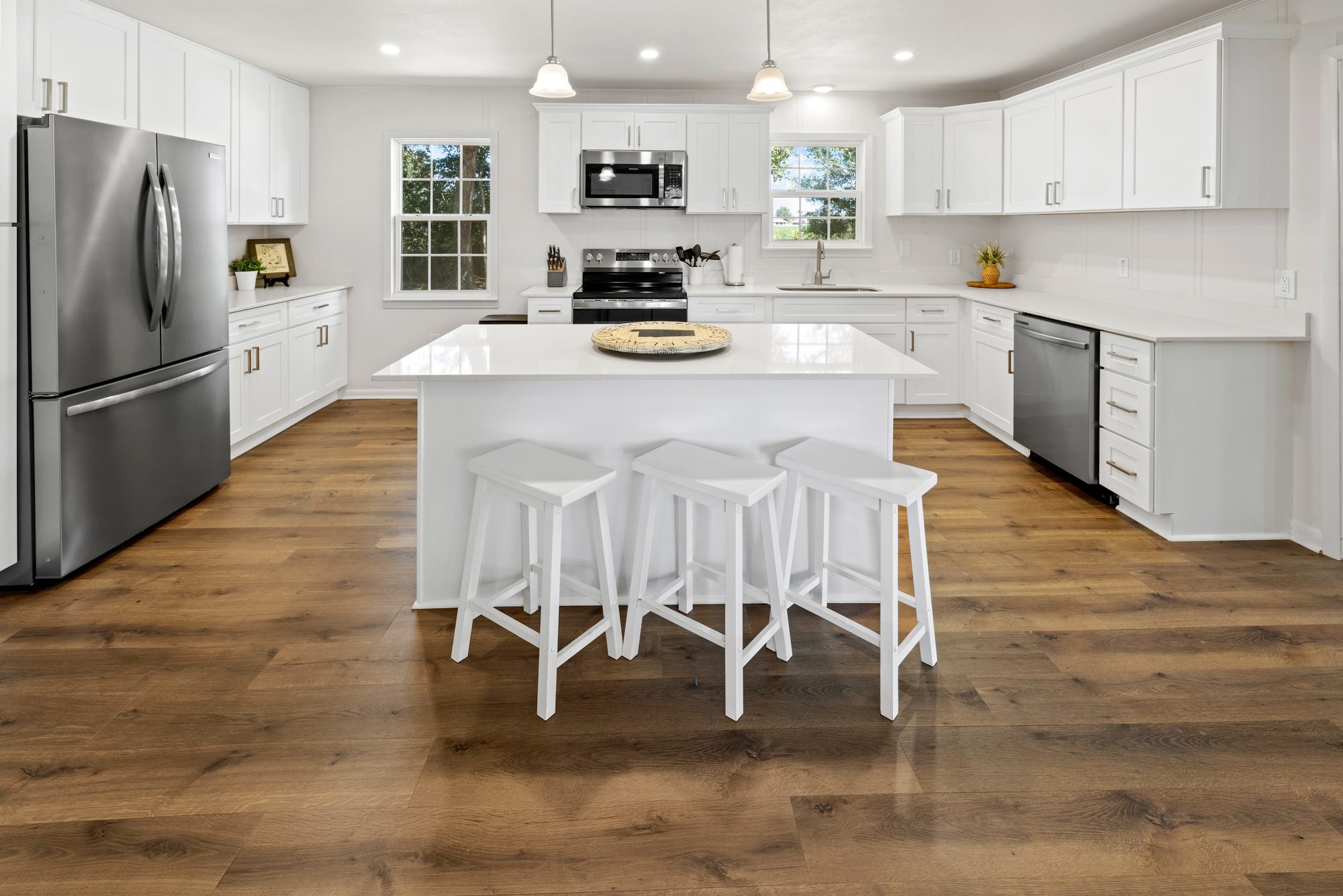 Open white kitchen with island