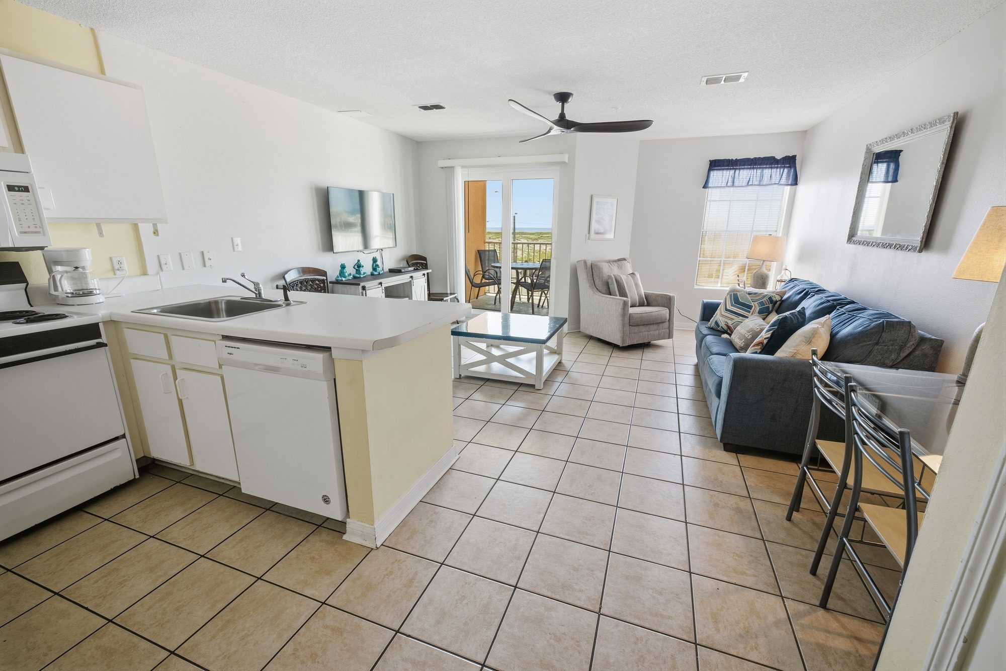 Condominium living area and kitchen