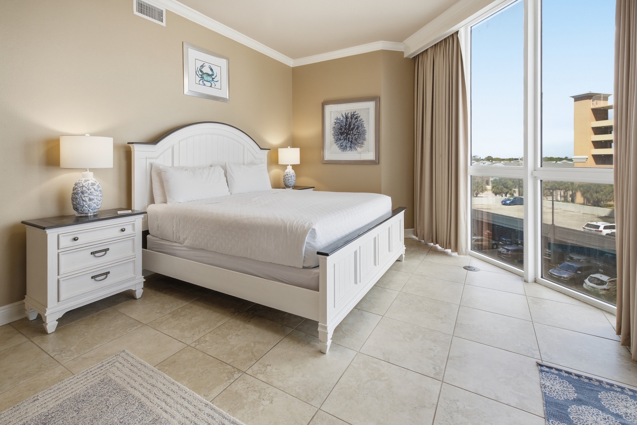 Bright coastal condo bedroom