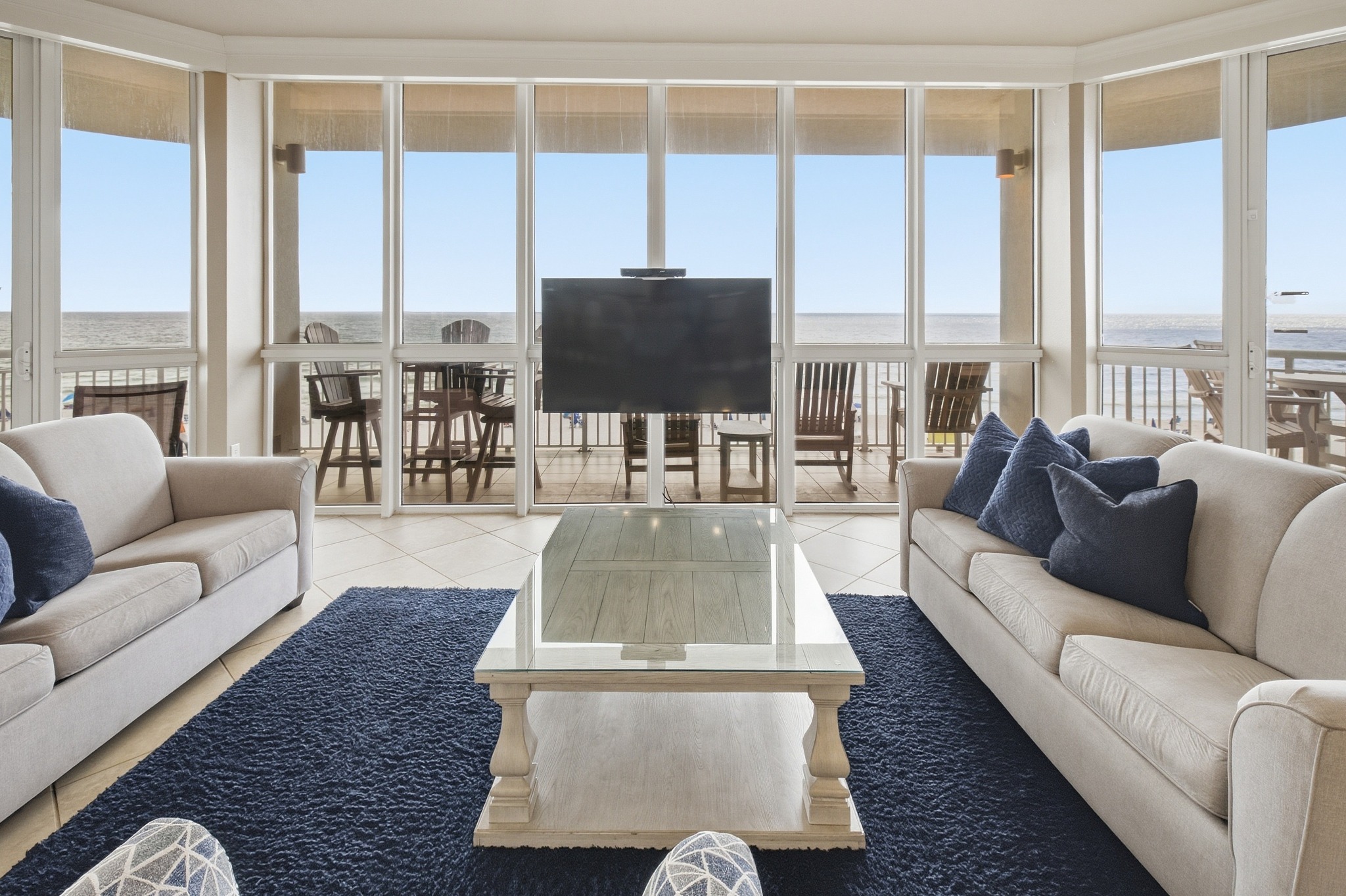 Coastal condo living room facing the waterfront