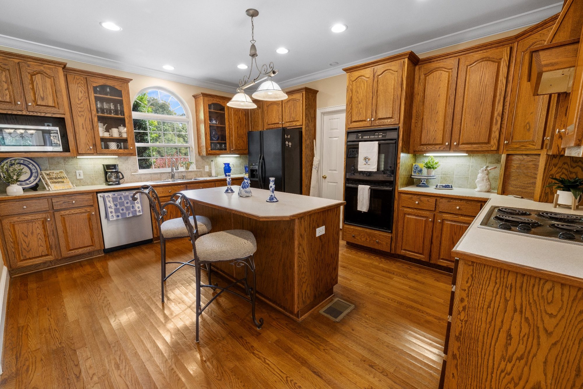 Warm wood kitchen with island